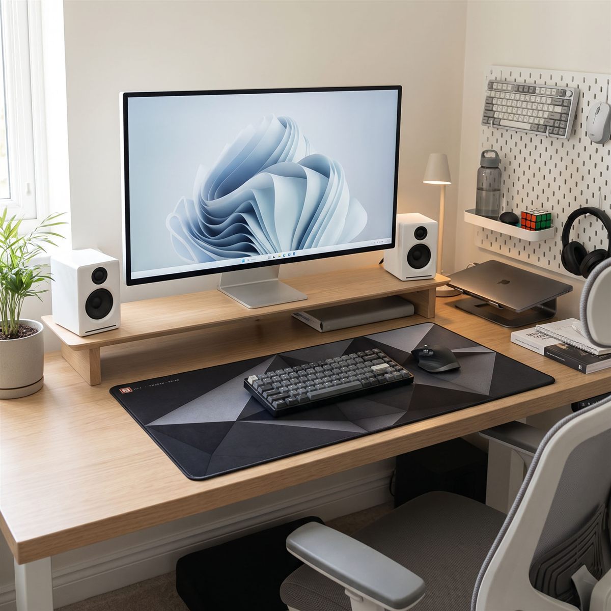 A tidy desk with storage kept off the surface